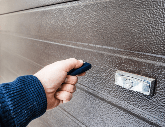 Opening an overhead door using a remote.