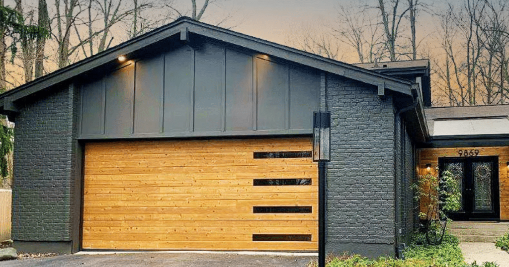 Modern wood garage door with glass slits.