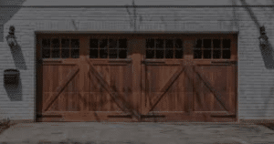 Is it cheaper to repair or replace a garage door?