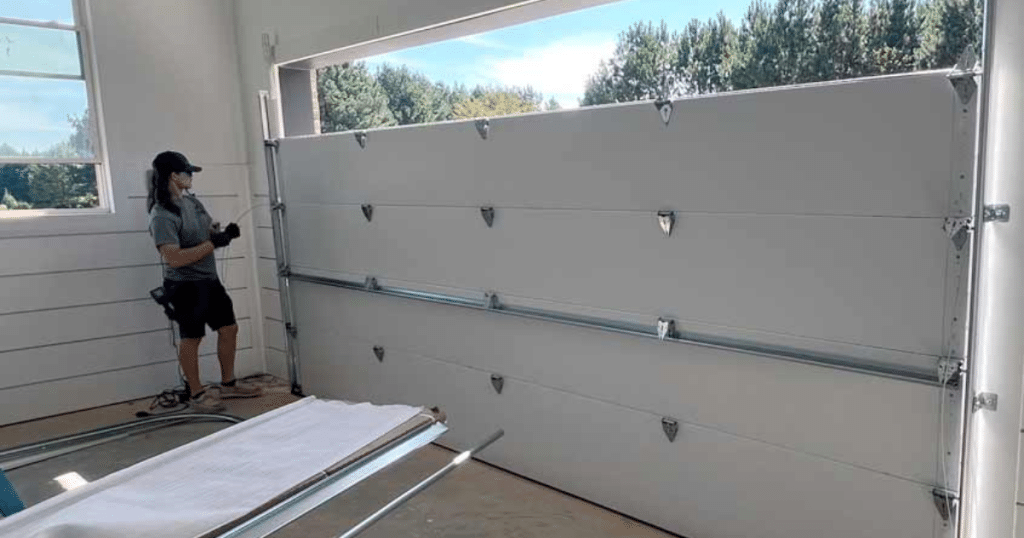 Can I service my own garage door?